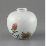 A Chinese underglaze copper red and enamelled porcelain water pot, Kangxi mark but later