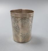 A French white metal tumbler cup, decorated with flowers and butterflies, 7.5cm