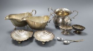 A pair of modern silver sauceboats, a George V sugar bowl, a pair of George III sugar tongs, a