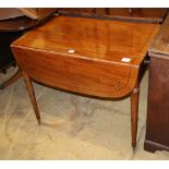 A Regency mahogany and ebony line inlaid Pembroke table, W.82cm