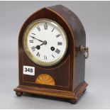 An Edwardian lancet shaped inlaid mantel clock