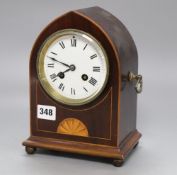 An Edwardian lancet shaped inlaid mantel clock