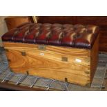 A camphorwood trunk with later leather upholstered top, W.94cm