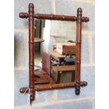 An Edwardian simulated bamboo frame wall mirror, H.56cm, W.45cm