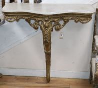 A 19th century French carved giltwood and gesso console table with serpentine marble top, W.94cm