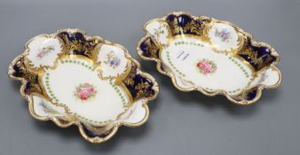 A pair of George Jones for Alfred Pearce Crescent china shaped oval dessert dishes, painted with