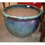 A blue glazed pottery garden planter, W.59cm, H.47cm