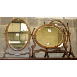 A mahogany skeleton framed toilet mirror with oval plate and two others