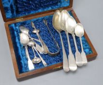 Two George III silver table spoons, ten other spoons and a pair of tongs, 11oz.