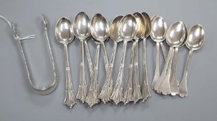 A set of 10 silver teaspoons and a pair of sugar tongs, London 1883, Frances Higgins III a set of of