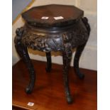 A Chinese ebonised hardwood octagonal jardiniere stand, W.35cm, H.46cm