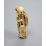 An 18th century Japanese netsuke of Gama Sennin, height 7cm