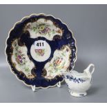 An 18th century Worcester blue scale plate, diameter 19.5cm and a sauceboatCONDITION: The plate