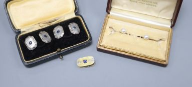 A pair of 14ct gold and sapphire cufflinks, gross 11.3 grams, a similar unmarked clip, gross 4.8