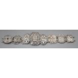 A Chinese silver 'shuangxi' belt, early 20th century, marked CW? 90, open length 68cmCONDITION: Some