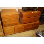 A mid century design teak low cabinet, W.168cm, D.53cm, H.50cm and two two drawer chests