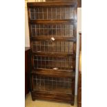 A five-section oak Globe Wernicke bookcase with leaded glass doors, W.85cm, D.34cm, H.188cm