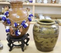 A Chinese straits earthenware matavan and a stoneware vessel on stand