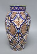 An early 20th century Isnik style pottery vase, height 34cm