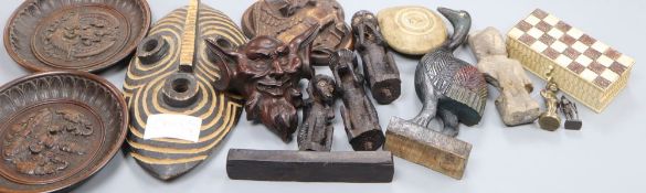 Various carvings including a bone miniature chess box, a mask, dishes etc.