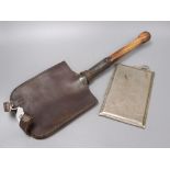 A WWII German Youth shovel, height 51cm, in leather cover and a military mirror