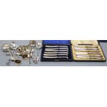 A silver ashtray, two silver and tortoiseshell menu holders and various spoons, 10.2oz. gross,