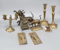 A quantity of mixed metalware including a pair of Indian deities, a pair of candlesticks and a