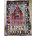 A Turkish prayer rug, 134 x 94cm