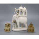 An Indian white marble elephant group, height 22cm and two soapstone elephants