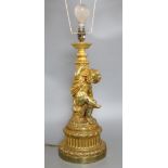 A gilt plaster 'cherub' table lamp