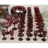 A quantity of cranberry glassware