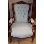 A Victorian mahogany open armchair