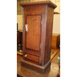 A 19th century mahogany banded oak pedestal bedside cupboard (converted from a longcase clock