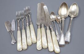 A quantity of silver cutlery, including four mother of pearl handled fruit knives and forks and