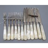 A set of six mother of pearl handled silver fruit knives and forks, Sheffield 1890 and a '