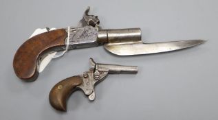 A 19th century boxlock pocket pistol, signed 'Degg', the turn off barrel with fixed bayonet,
