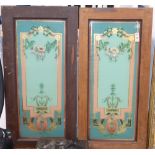 A pair of pine doors inset decorative reverse-painted and gilded glass panels with floral and