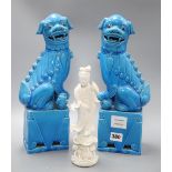 A pair of Chinese turquoise glazed temple dogs, height 36cm and a blanc de chine Kwan Yin