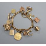 A 9ct gold charm bracelet, 43.7g gross