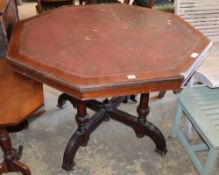 A late Victorian Gothic revival octagonal mahogany library table, W.106cm, H.75cmCONDITION: The