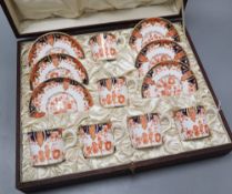 A Royal Crown Derby cased coffee set