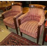 A set of four mahogany framed tub shaped theatre viewing armchairs, with red and cream striped