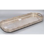 A silver plated oval tray with pierced gallery, width 62cm