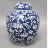 A large Chinese blue and white jar and cover, Kangxi mark, late 19th century, height 30cm