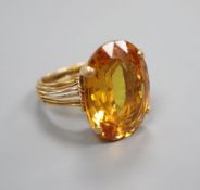 A citrine dress ring, tests as 18ct gold, 12.2g gross