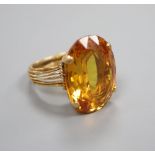 A citrine dress ring, tests as 18ct gold, 12.2g gross