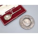 An Asprey silver spoon and a Japanese white metal dragon dish, marked pure silver