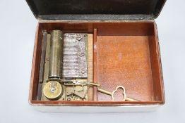 An Edwardian silver musical cigarette box, Birmingham 1907, mahogany lined, the Swiss musical