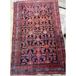 A Kurdish blue ground rug, 190 x 120cm