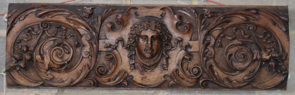 A Victorian carved oak wall plaque, 99 x 30cm